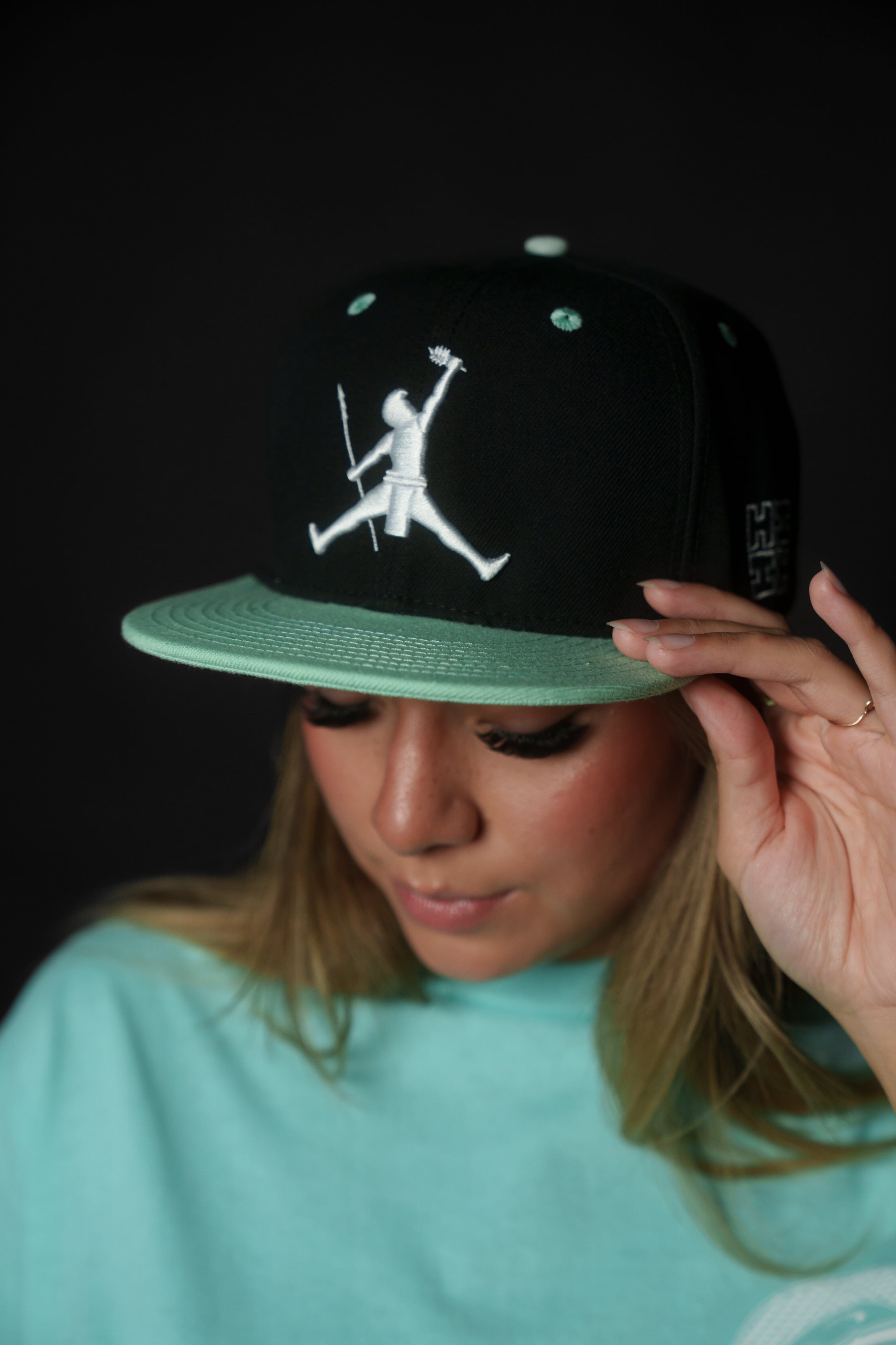 BLACK & TEAL KANAKA JUMPMAN HAT